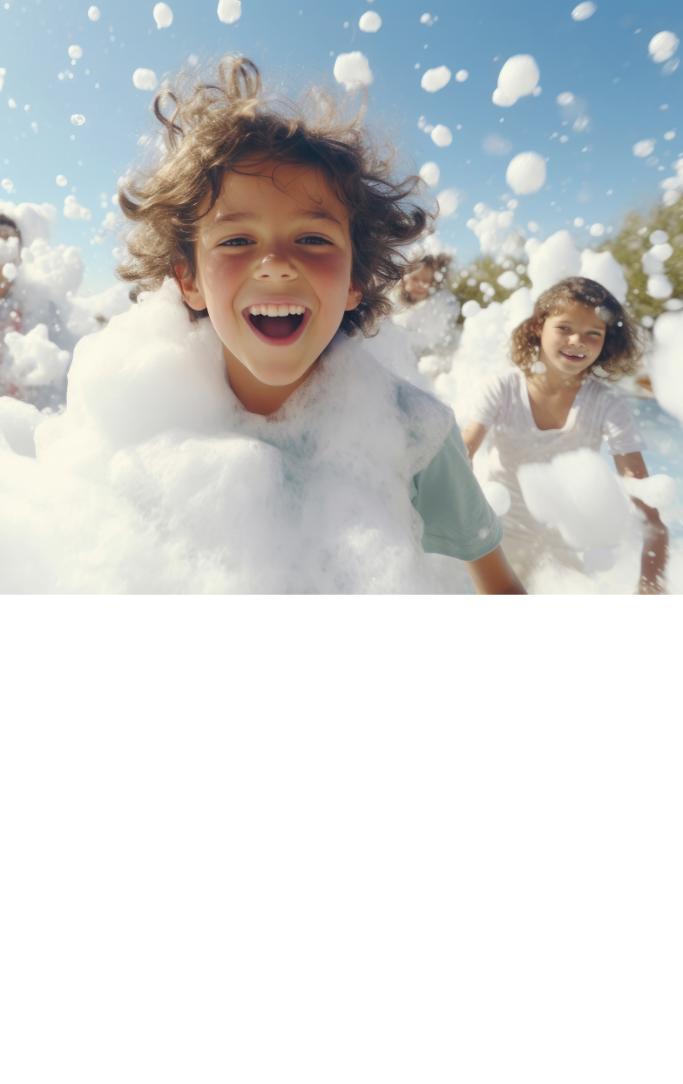 Child playing outside in foam 