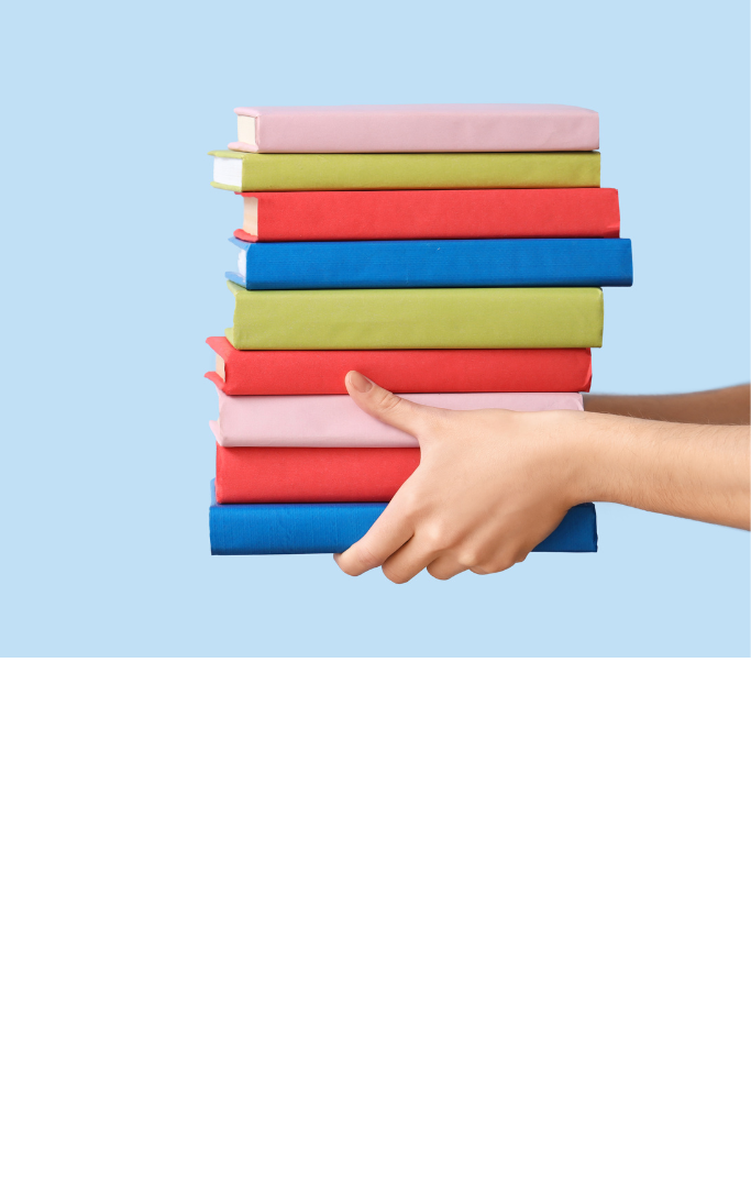 hands holding a stack of books