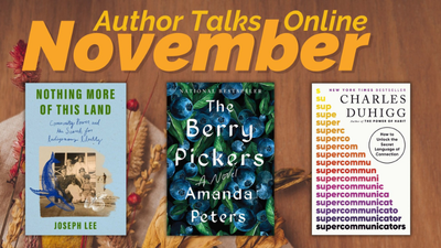 wooden background with dried leaves, flowers, and book covers