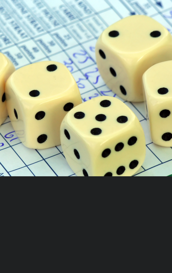 a picture of dice and a scorecard