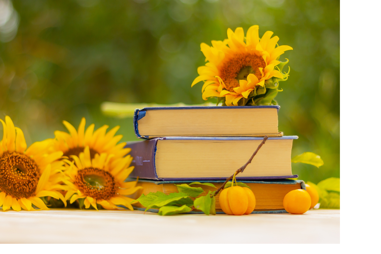 a vibrant outdoor scene with sunflowers and a stack of books 
