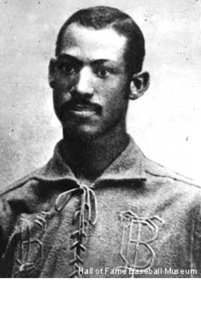 vintage photograph of a man in an old baseball uniform